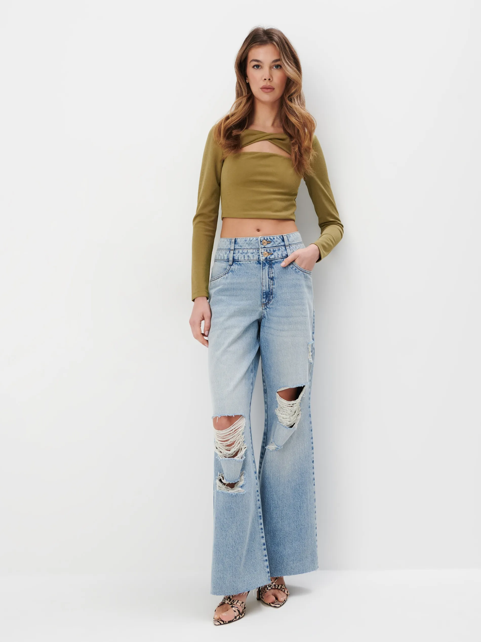 Blusa con scollo profondo sulla schiena
