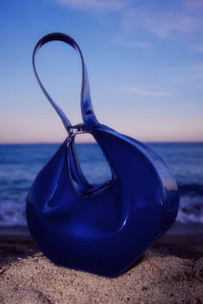 Borsa a mano con chiusura a bottone in metallo